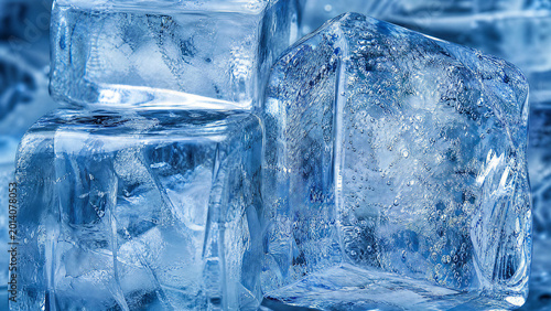 Fotografi Stacked transparent blue ice cubes