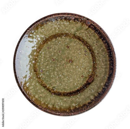 Obraz na plátně Top view of rustic antique style ceramic plate with reactive bronze glaze isolated on white background