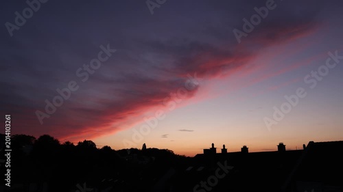 Dramatic Red Sunset Over German Town Skyline