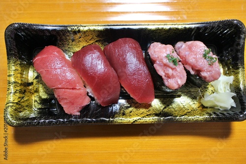 Assorted toro (fatty tuna) nigirizushi purchased at a supermarket in Tokyo, Japan