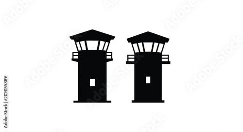 Billede på lærred Two guard towers in black silhouette against a white background