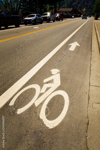 Bicycling path sign on a road surface, a dedicated cycle lane.