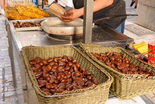 Edible chestnuts at a stand on Ermou Street in Athens. Greece