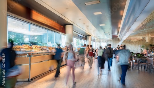 blurred people walking in the busy fast food restaurant motion blur time lapse consumers