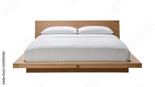 Foto Isolated modern wooden platform bed with white pillows and duvet, contemporary bedroom furniture