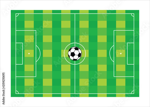 A green soccer field with a ball on it