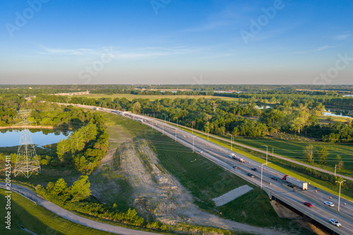 Картината върху платно morning traffic on a freeway approaching Chain of Rocks bridge from Illinois