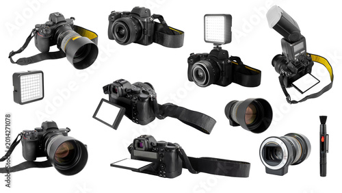 professional photo equipment set with cameras lenses flash and led panel on white background