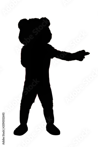 Schilderij op canvas Teddy bear mascot silhouette pointing forward with a determined expression