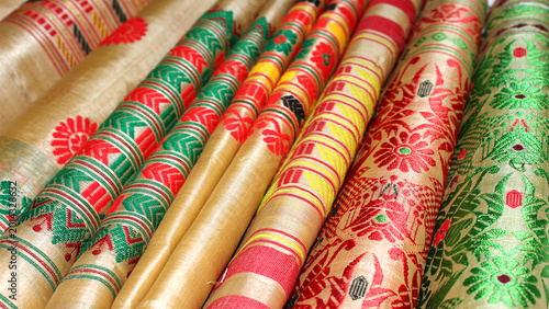 фотографія Traditional Assamese silk mekhela chador fabrics with colourful woven floral and