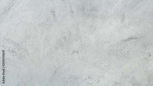 Light gray concrete texture background with subtle brush marks and weathered cement surface