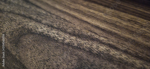 Obraz na płótnie Closeup view of a textured woven fabric with a subtle striped pattern in earthy tones