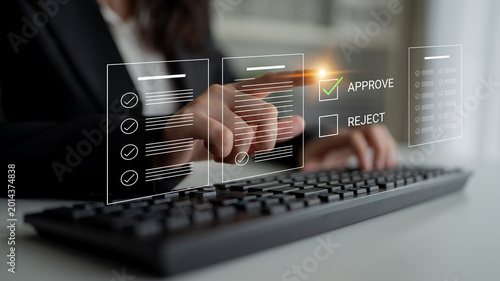 Obraz na płótnie A business professional engages with a futuristic interface, choosing between approval and rejection for digital documents, showcasing modern decision-making in the office