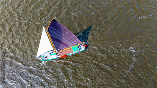 Bild auf Leinwand Top view of traditional sailing vessel on an inland lake in Europe