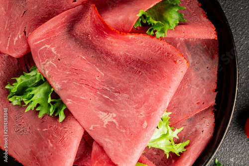 Foto Beef ham thin slices of veal ham meat dish lunch or dinner tasty snack fresh, de