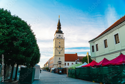 Картината върху платно Market stalls near City Tower in Trnava old town