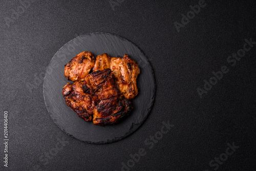 Chicken or turkey, poultry breast baked on the grill or barbecue. Grilled chicken