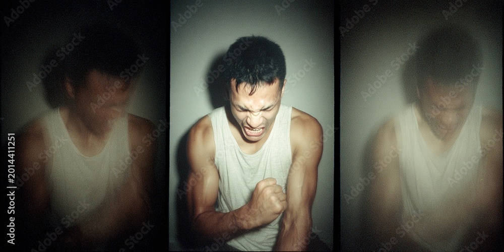 Obraz premium Angry Man in White Tank Top