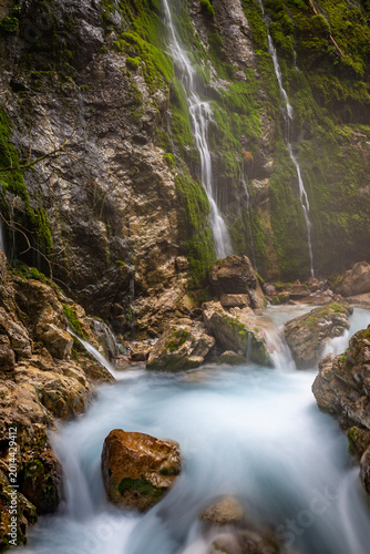 Wimbachklamm is a stunning gorge with waterfalls and flowing river water in Bayern, Germany.