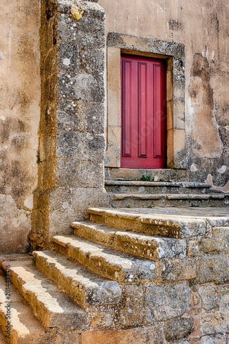 Slika na platnu Red Door With Stairs In Castelo Rodrigo