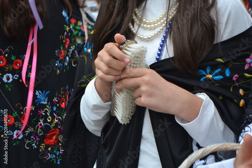 Cuadro en lienzo Traditional la maya festival girl holding a decorative brush wearing embroidered