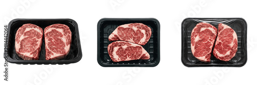 Set and collection of fresh raw ribeye beef steaks in black tray isolated on white background