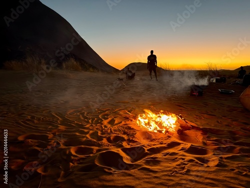 Fotografie sunset with fire in front of Ben Amira monolith, Mauritania