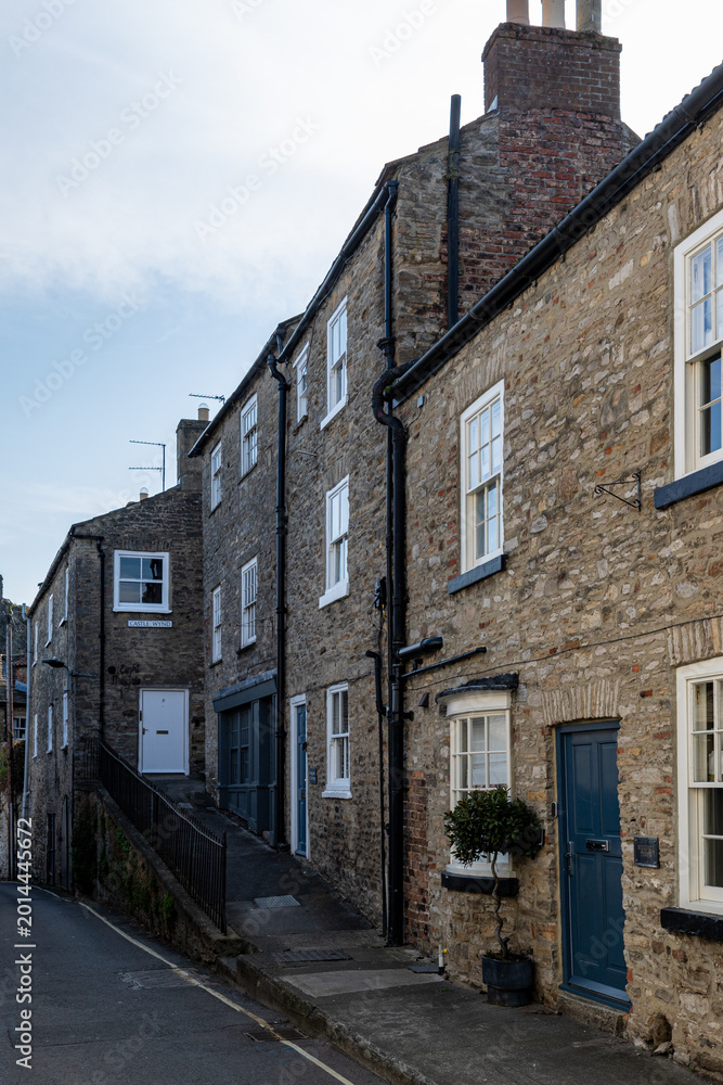 Fototapeta premium Stone cottages with blue door in Richmond, North Yorkshire, England