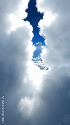 Flying through cumulus clouds at high altitude with clear skies