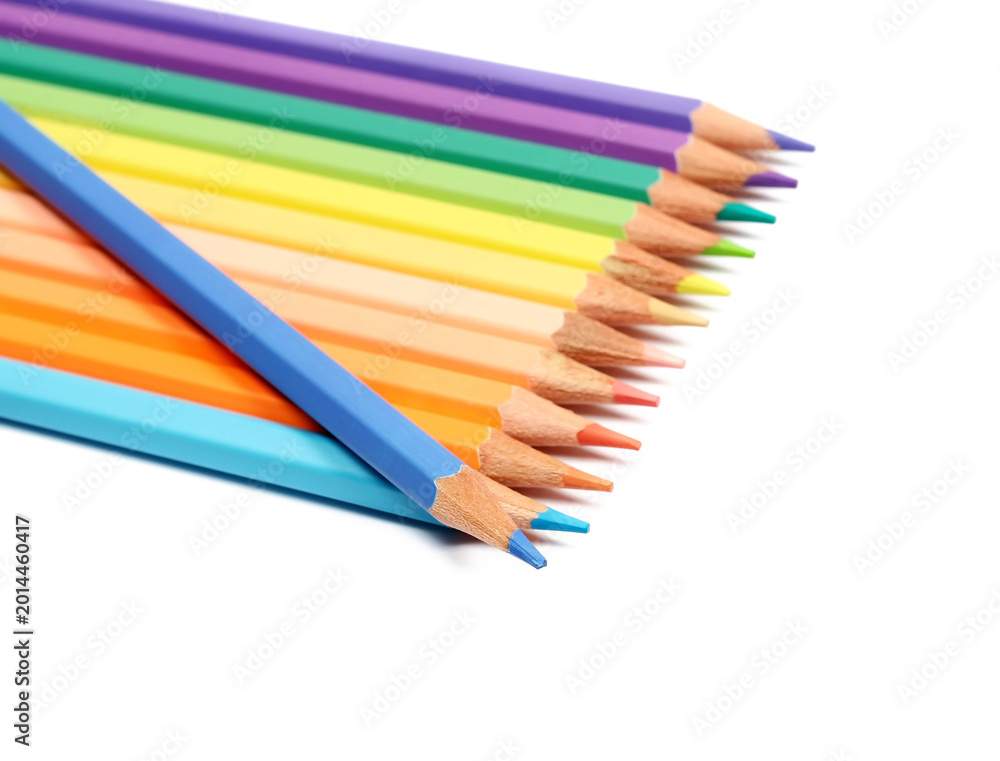 Fototapeta premium Close up colorful pencils set arrangement, row isolated on white background, side view