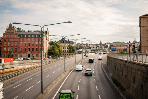Canvas Print Stockholm Sweden Urban Highway with Traffic Cars and Bus Leading into Cityscape