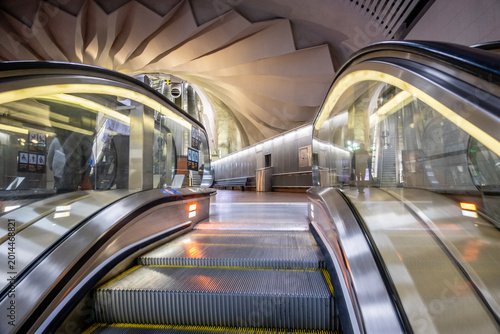  Modern Escalator in Stockholm Sweden Metro Station with Curved Architectural Ceiling and Sleek Underground Transportation Design