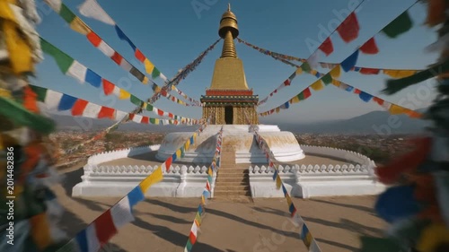 Buddhist Stupa with Colorful Prayer Flags on a Mountain Peak