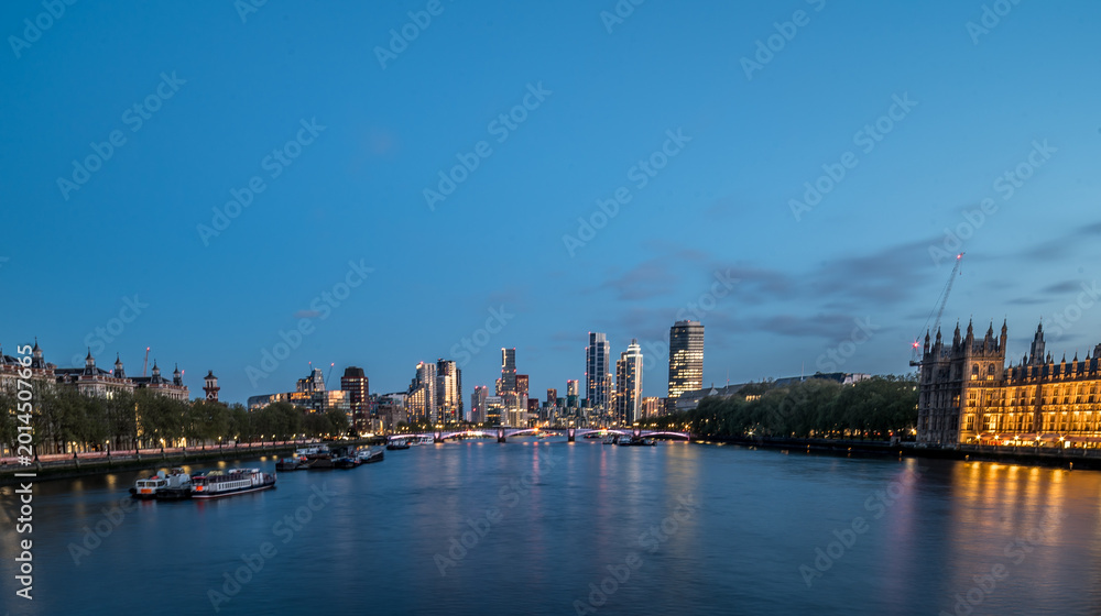 Fototapeta premium London Skyline from River Thames at Blue Hour Evening Cityscape