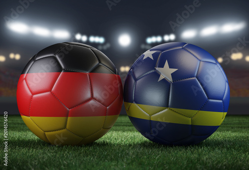 Two soccer balls in flags colors on a stadium blurred background. Germany and Curacao. 3D image.