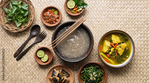 Traditional Papeda flat lay composition for culinary branding, tourism campaigns, cultural publications, and Indonesian food marketing.