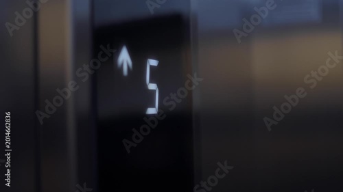 Moving up in an elevator to the fourth floor
