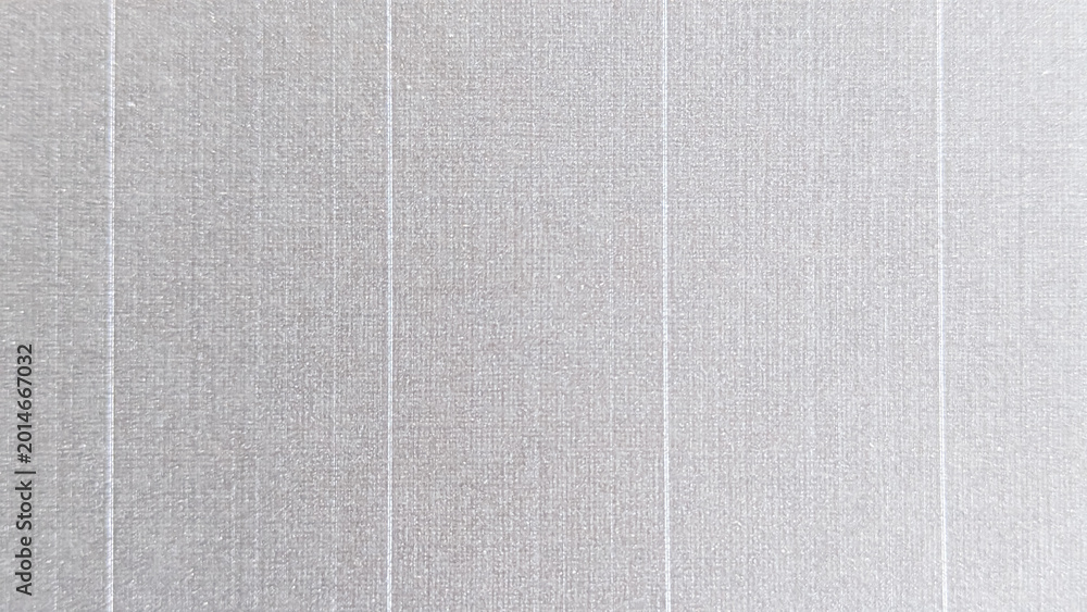 Fototapeta premium Light gray fabric texture background with vertical stripe pattern and soft woven details, ideal for wallpaper, interior design, and modern backdrop concepts.