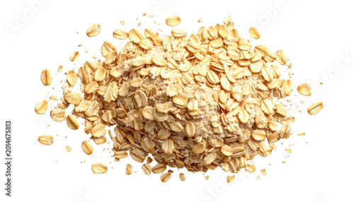 Pile of dry, light brown, rolled oats against a black background