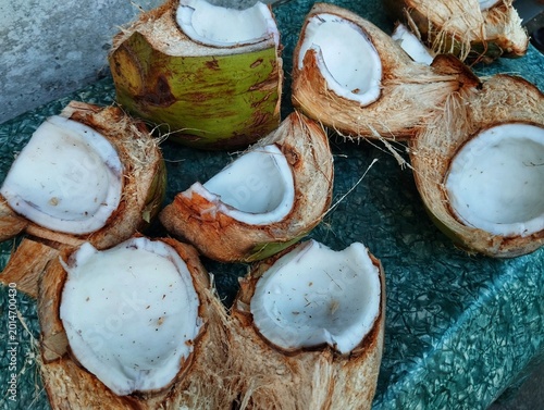 Freshly split young coconuts 