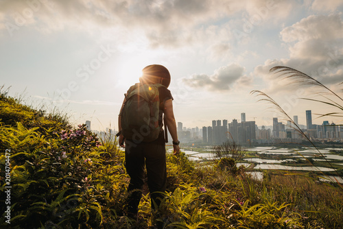 Photography Woman hiking on mountain top in Hong Kong