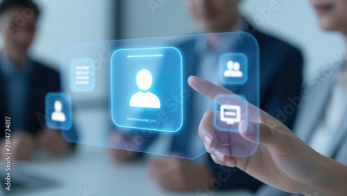 Recruitment in Focus: A person interacts with a futuristic digital interface, showcasing a potential candidate selection. A subtle background hints at a professional business environment.