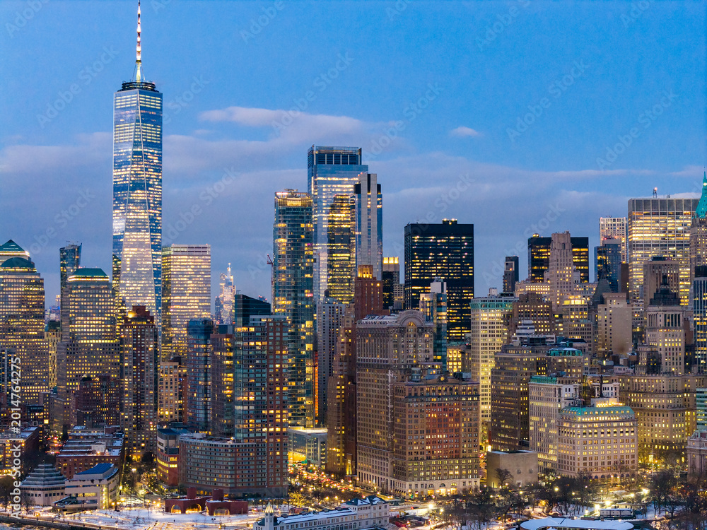 Fototapeta premium New York over Hudson River. NYC Manhattan skyline at night. New York downtown panorama. Manhattan skyscrapers horizon.
