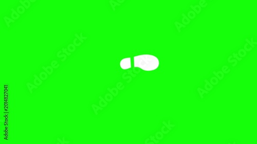 Animation of footprints with shoes on a green background. Feet walking non stop.