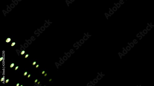 Colorful rows of blurry led dots transitioning through a rainbow spectrum.