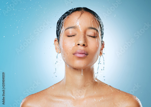 Cuadro en lienzo Beauty, skincare and shower with woman in studio for self care, dermatology and water drop