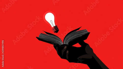Creative concept with hand holding book and glowing light bulb idea