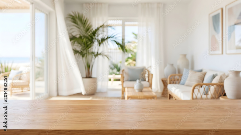 Fototapeta premium Empty wooden tabletop background with blurred bright coastal living room interior for product display mockup