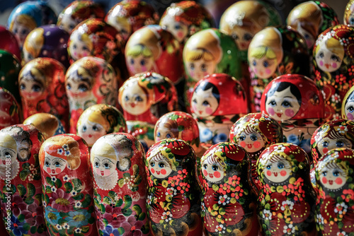 Foto Patterns of cute colorful nesting babushka dolls for sale in a market in Yerevan