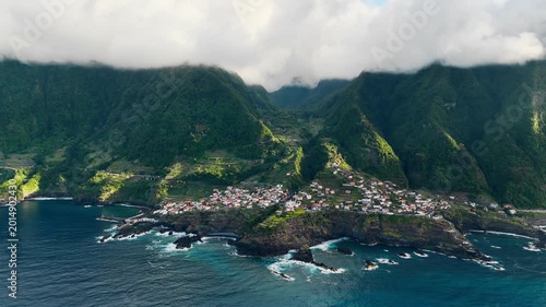 Drone view of Seixal, Madeira island, Portugal, coastal village between Atlantic Ocean and mountain slopes
